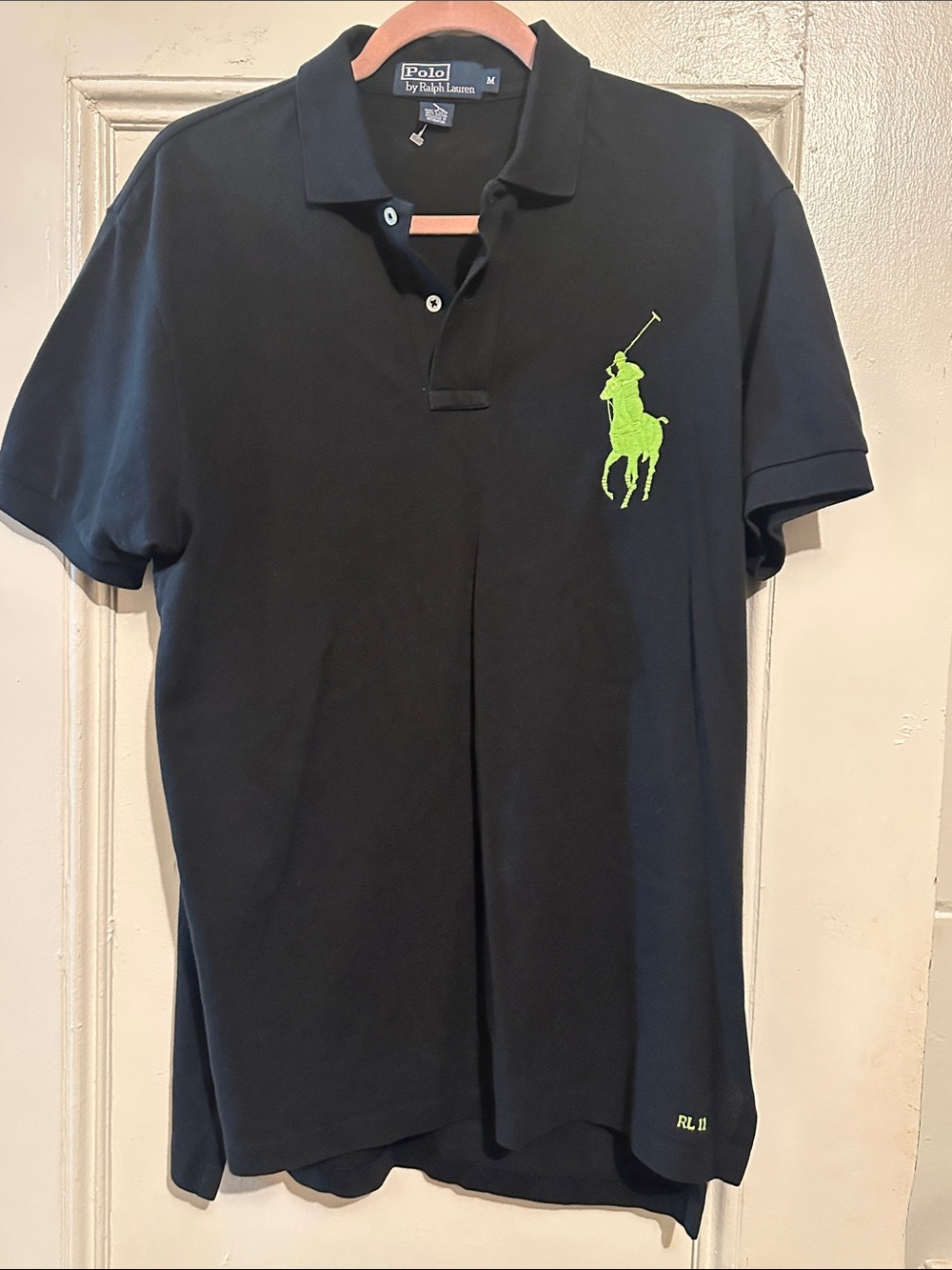 Like New. Polo by Ralph Lauren Black Polo with Neon Green Pony. Size Medium.